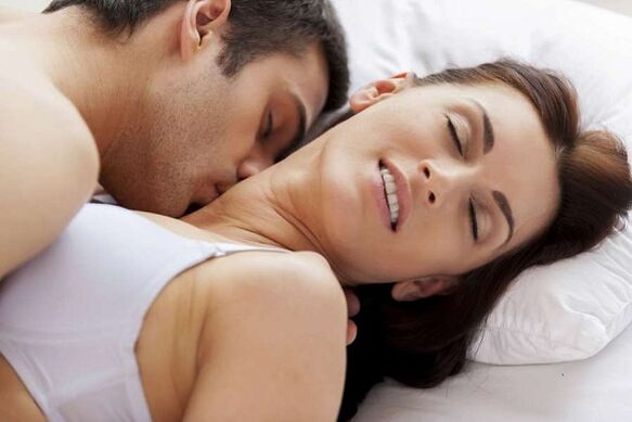 Animated man and woman in bed